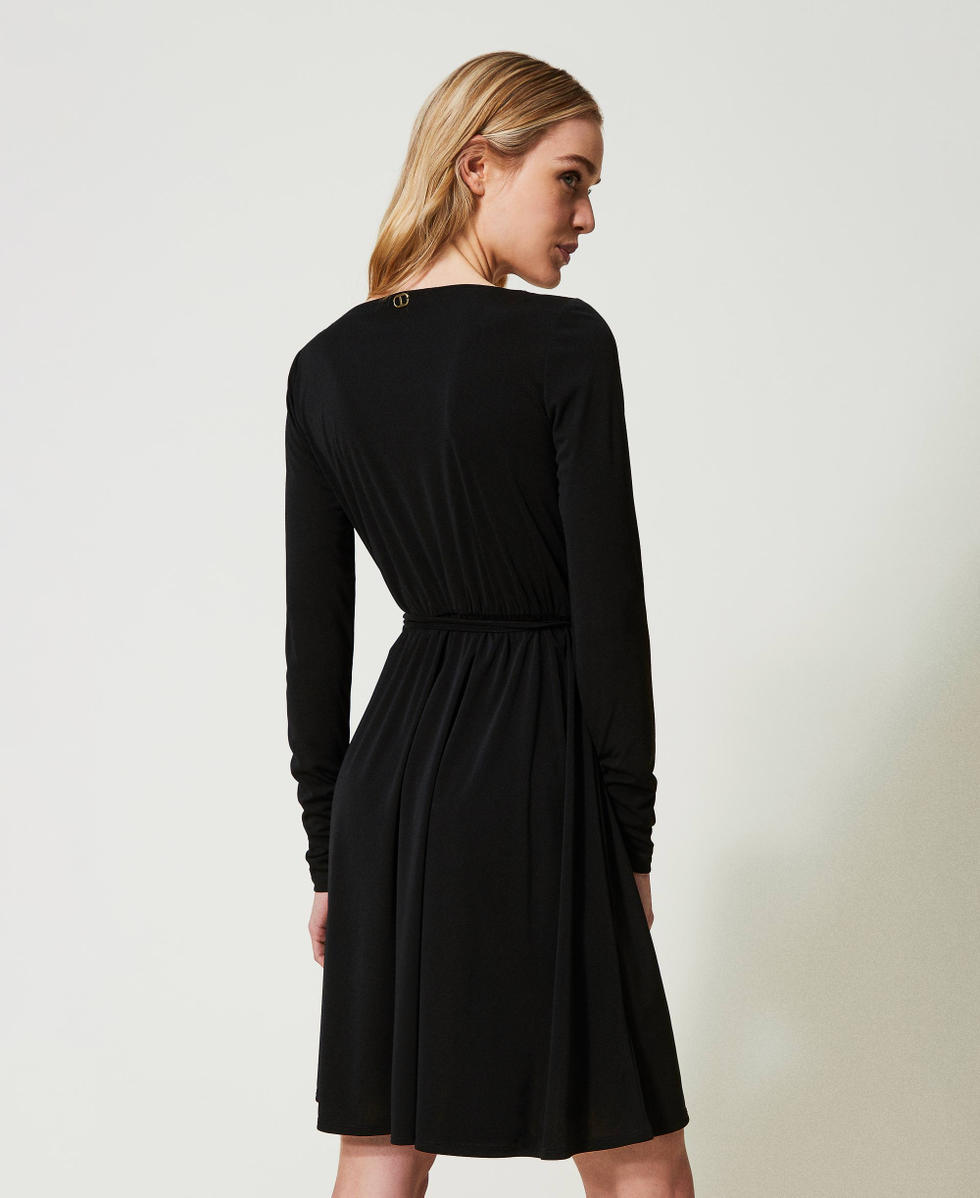 Short dress with logo belt