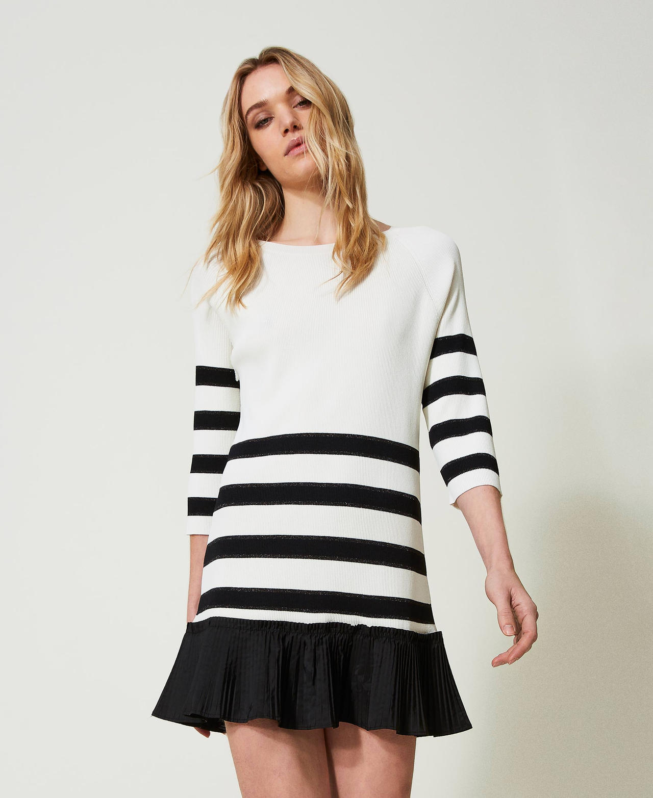 Short dress with pleated flounce