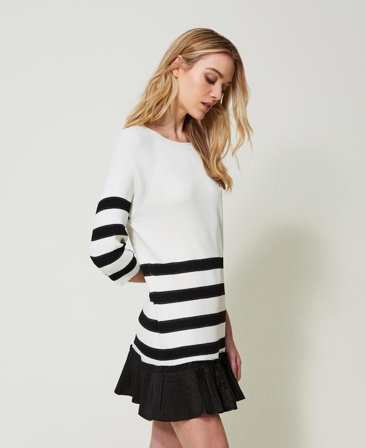 Short dress with pleated flounce
