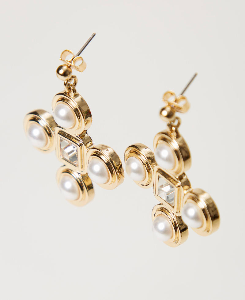 Boucles d’oreilles pendantes en croix