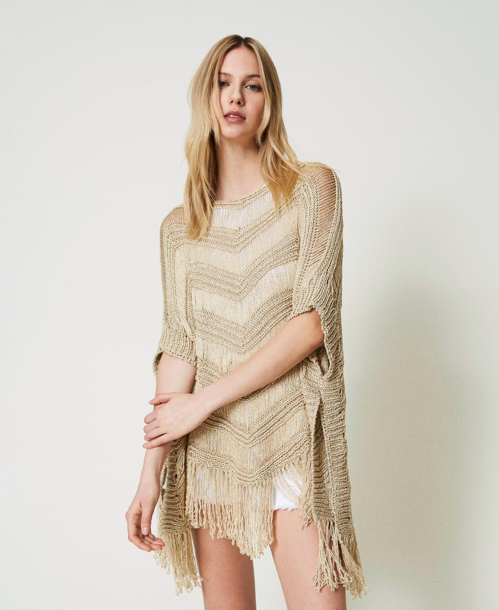 Poncho en maille avec franges