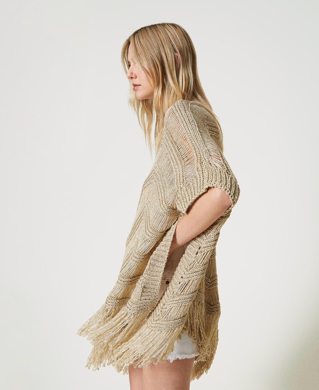 Poncho en maille avec franges