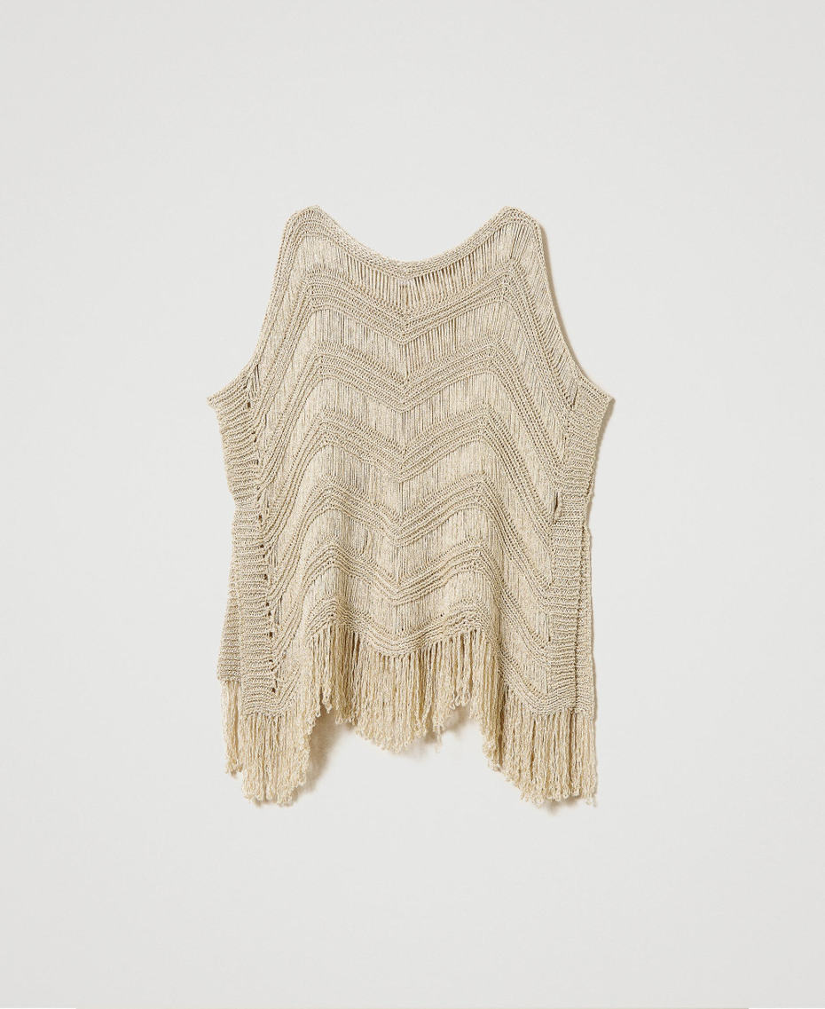 Knit poncho with fringes