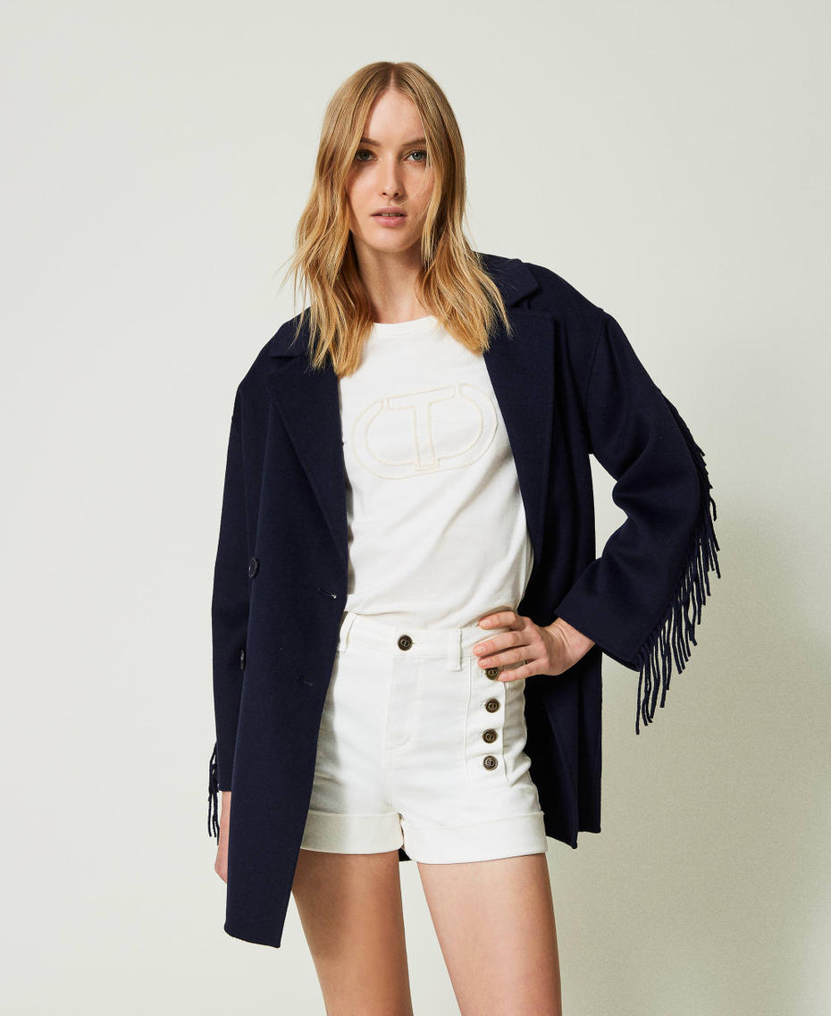 Manteau en tissu double de laine avec franges