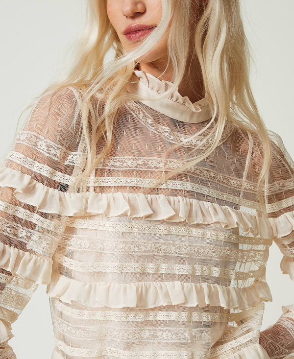 Blusa in tulle plumetis e pizzo