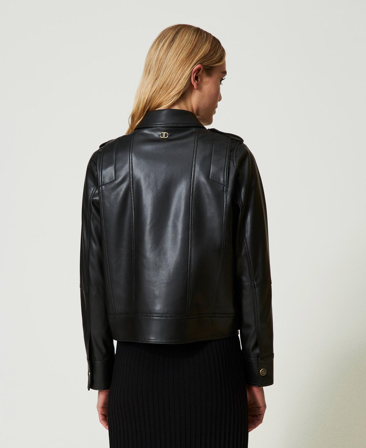 Leather-like jacket with maxi pockets