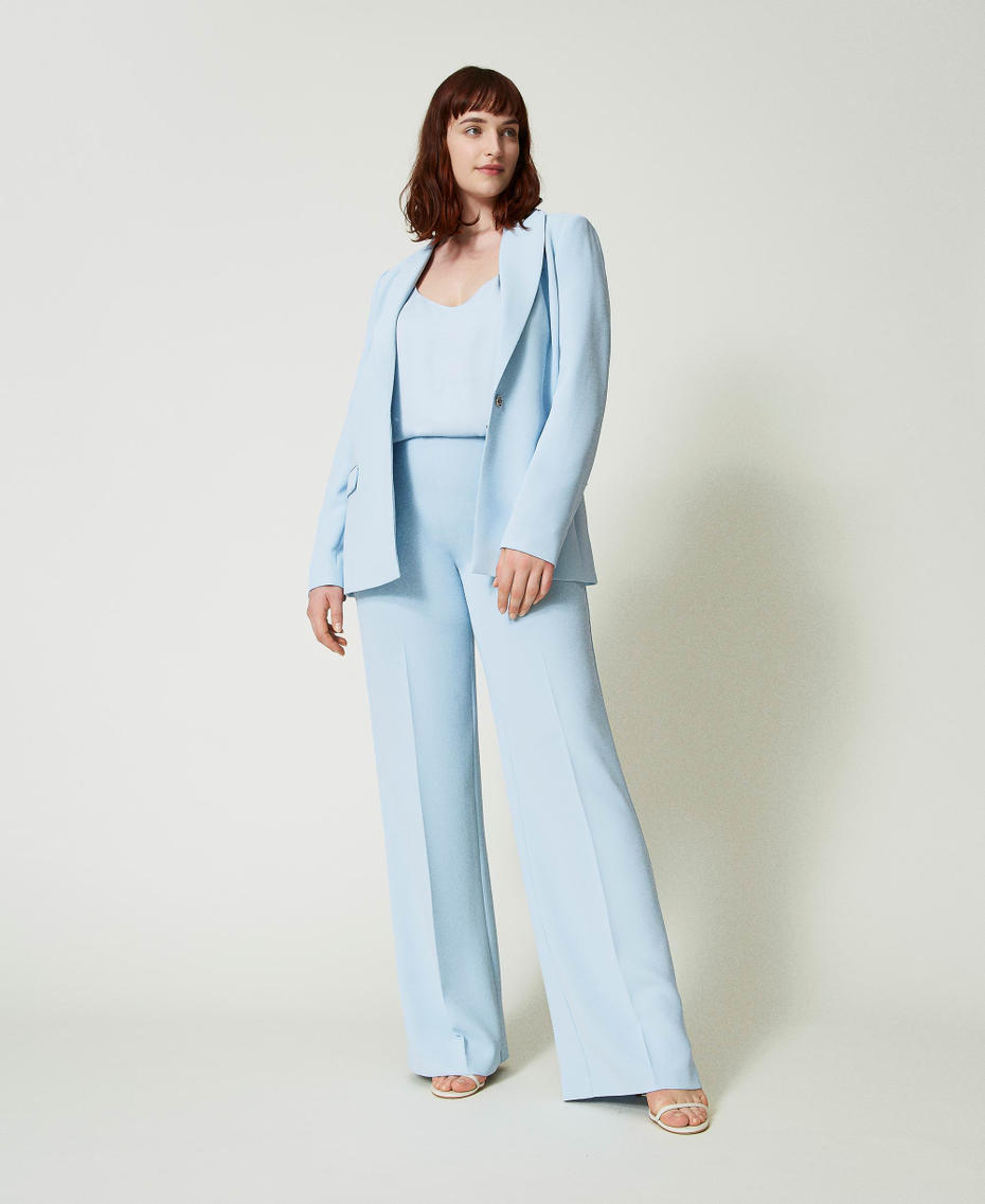 Pantaloni flare in crêpe cady con piega