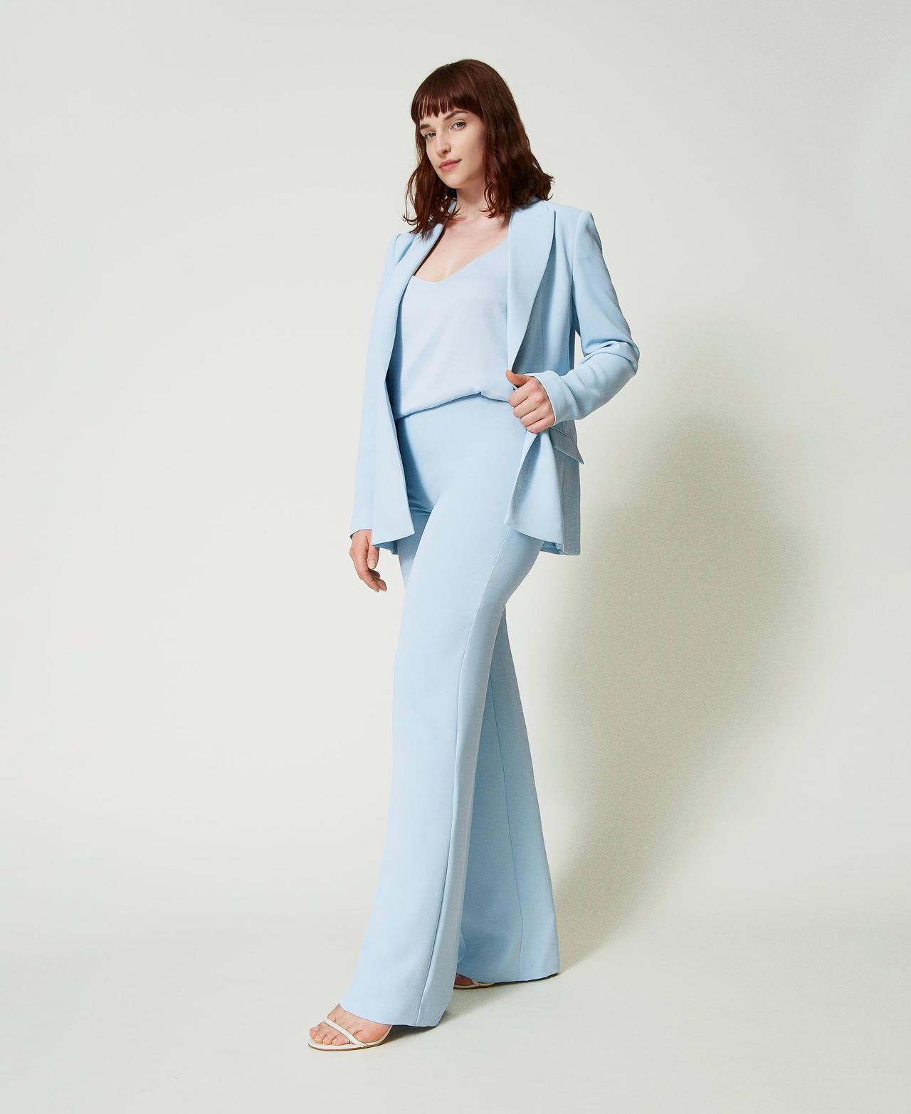 Pantaloni flare in crêpe cady con piega