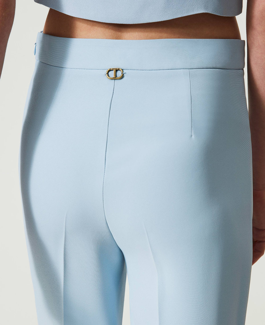 Pantaloni flare in crêpe cady con piega