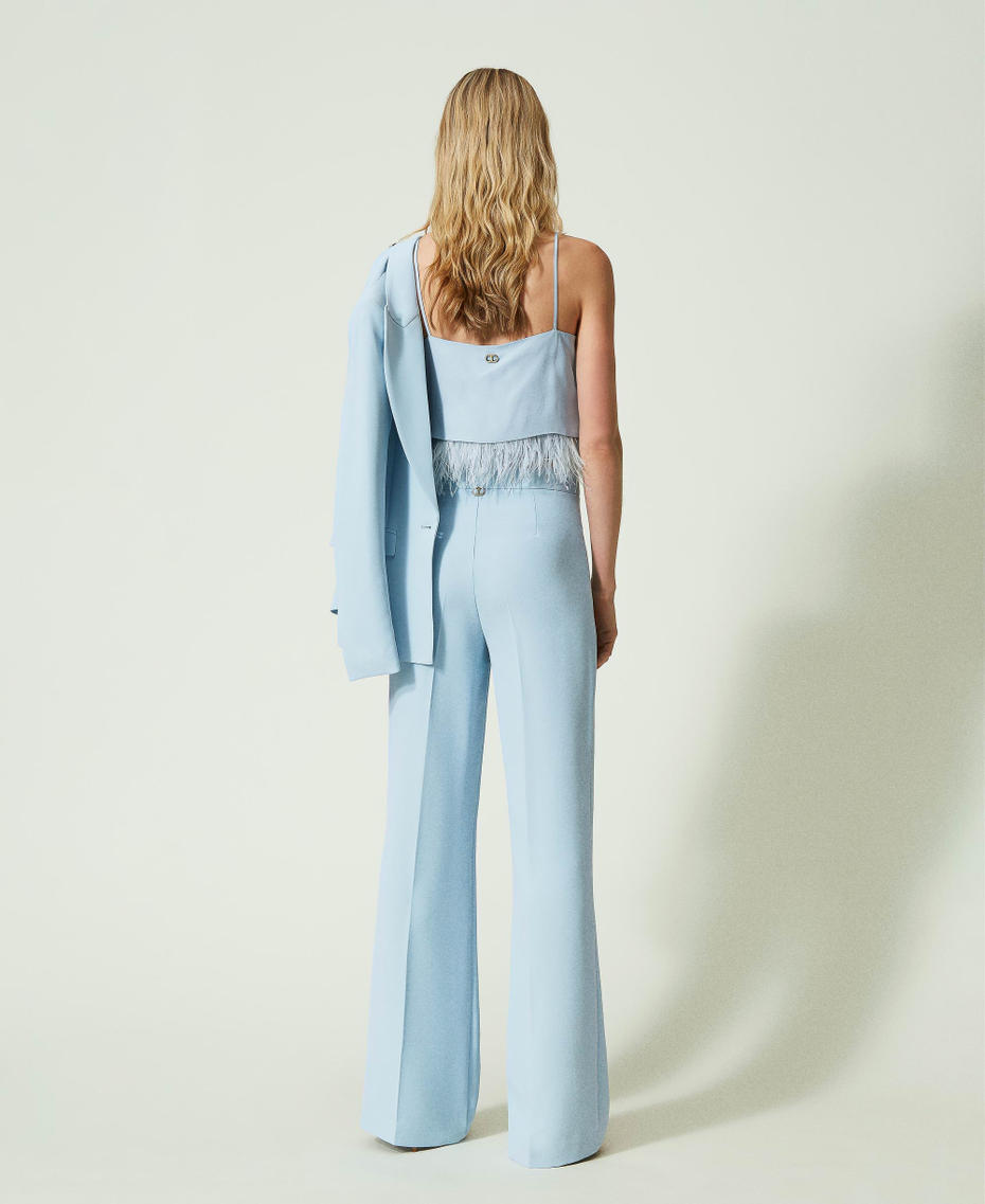 Pantaloni flare in crêpe cady con piega