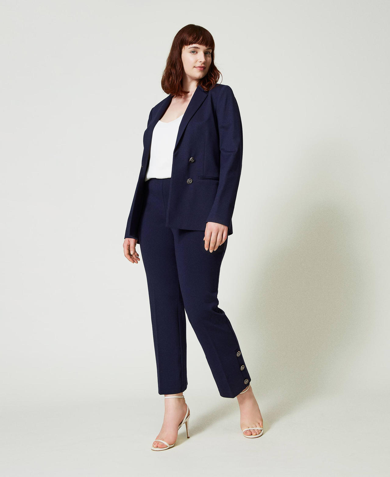 Cropped trousers with Oval T buttons