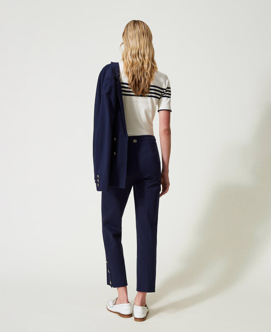 Cropped trousers with Oval T buttons