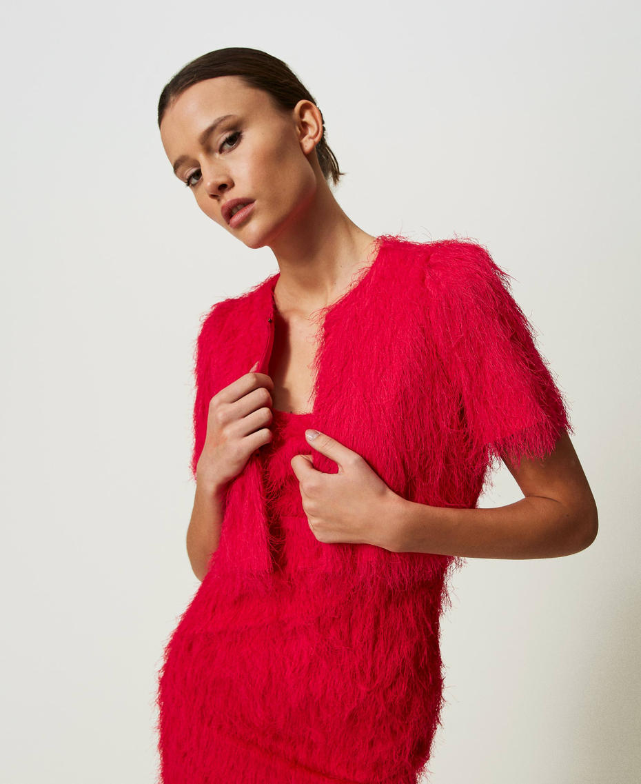 Shrug with feather-like threads