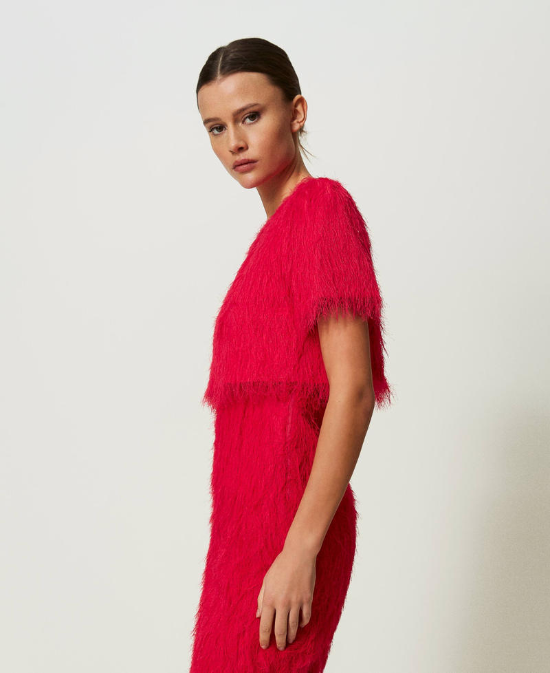 Shrug with feather-like threads