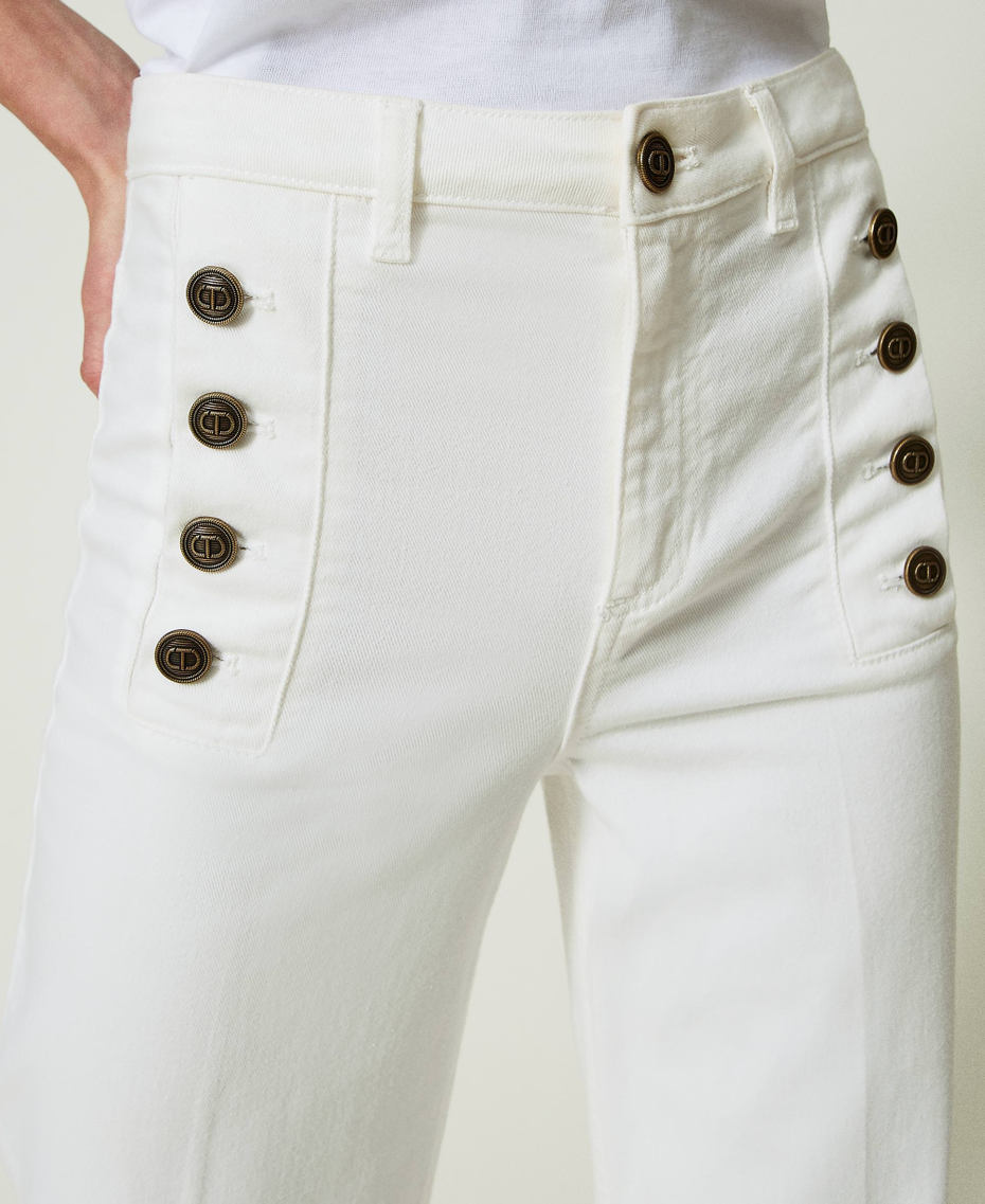 Flared white jeans with decorative buttons White Denim Woman 241TP2641-04