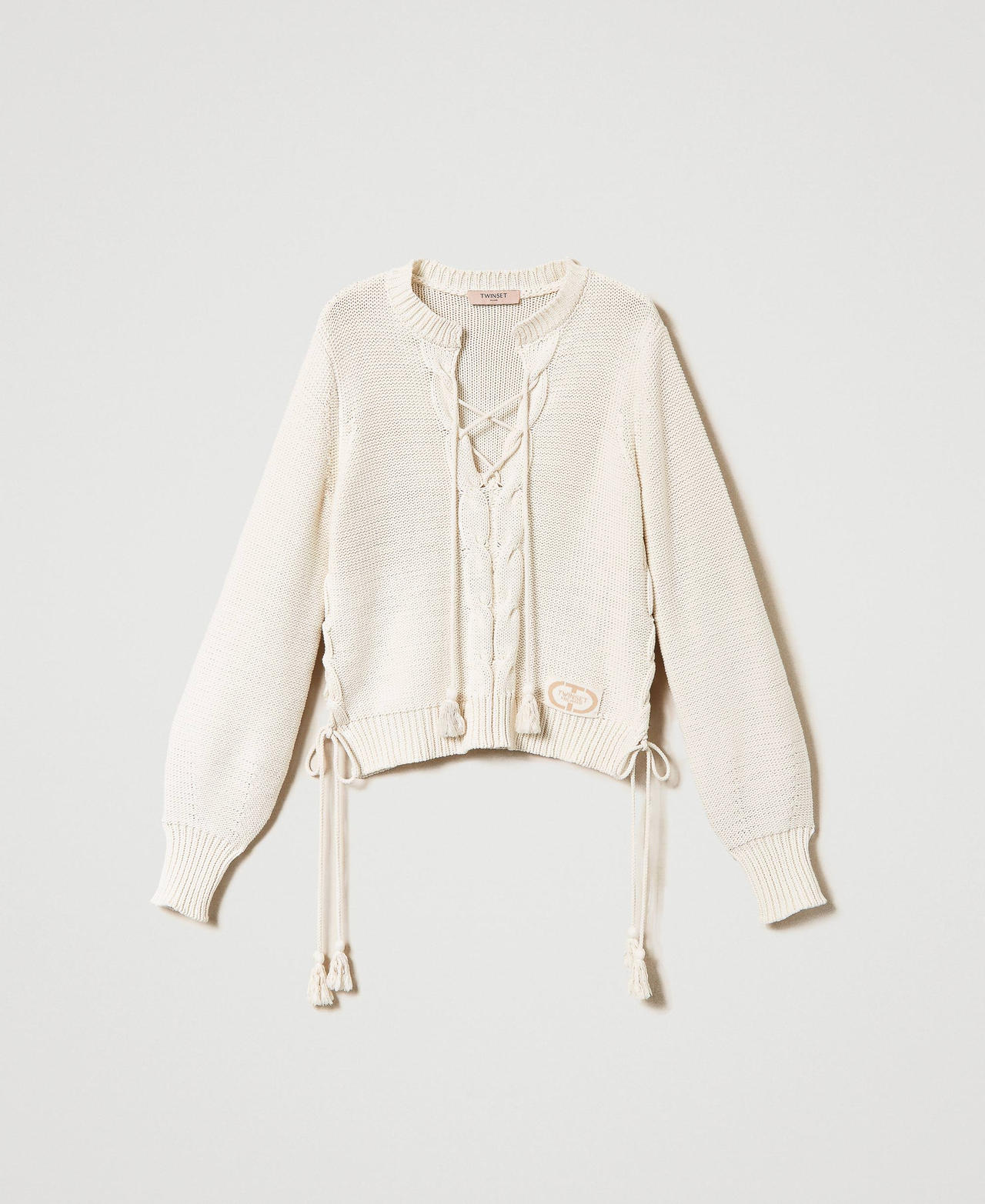 Jumper with criss-cross closure