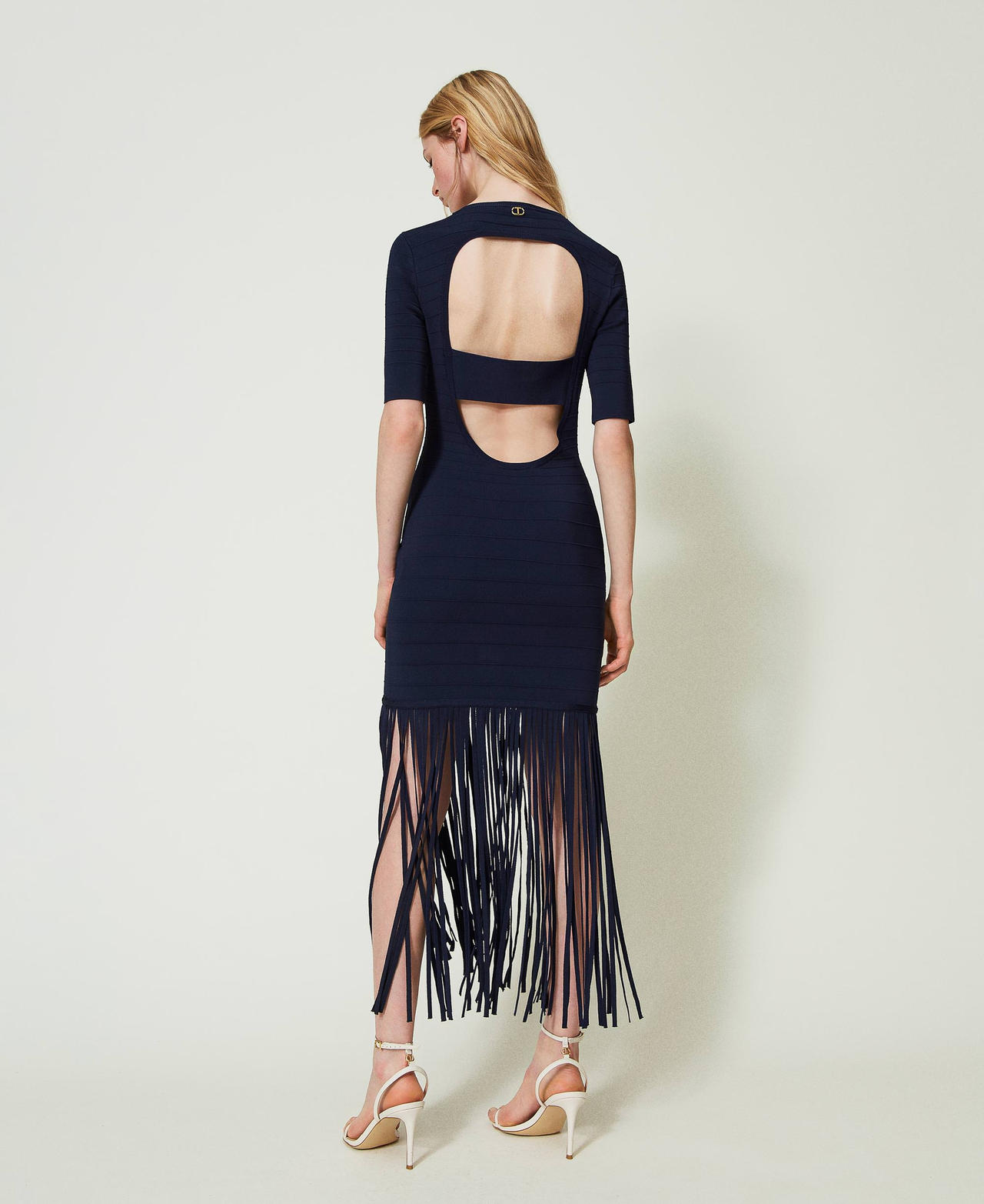 Short fitted knit dress with fringes