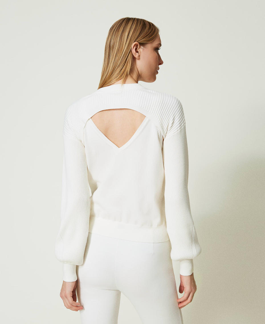 Knit top and shrug with Oval T chain
