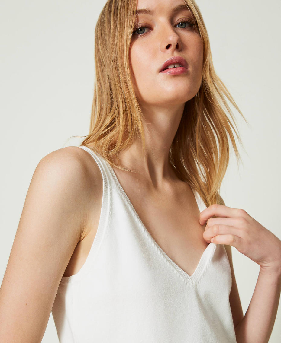 Knit top and shrug with Oval T chain