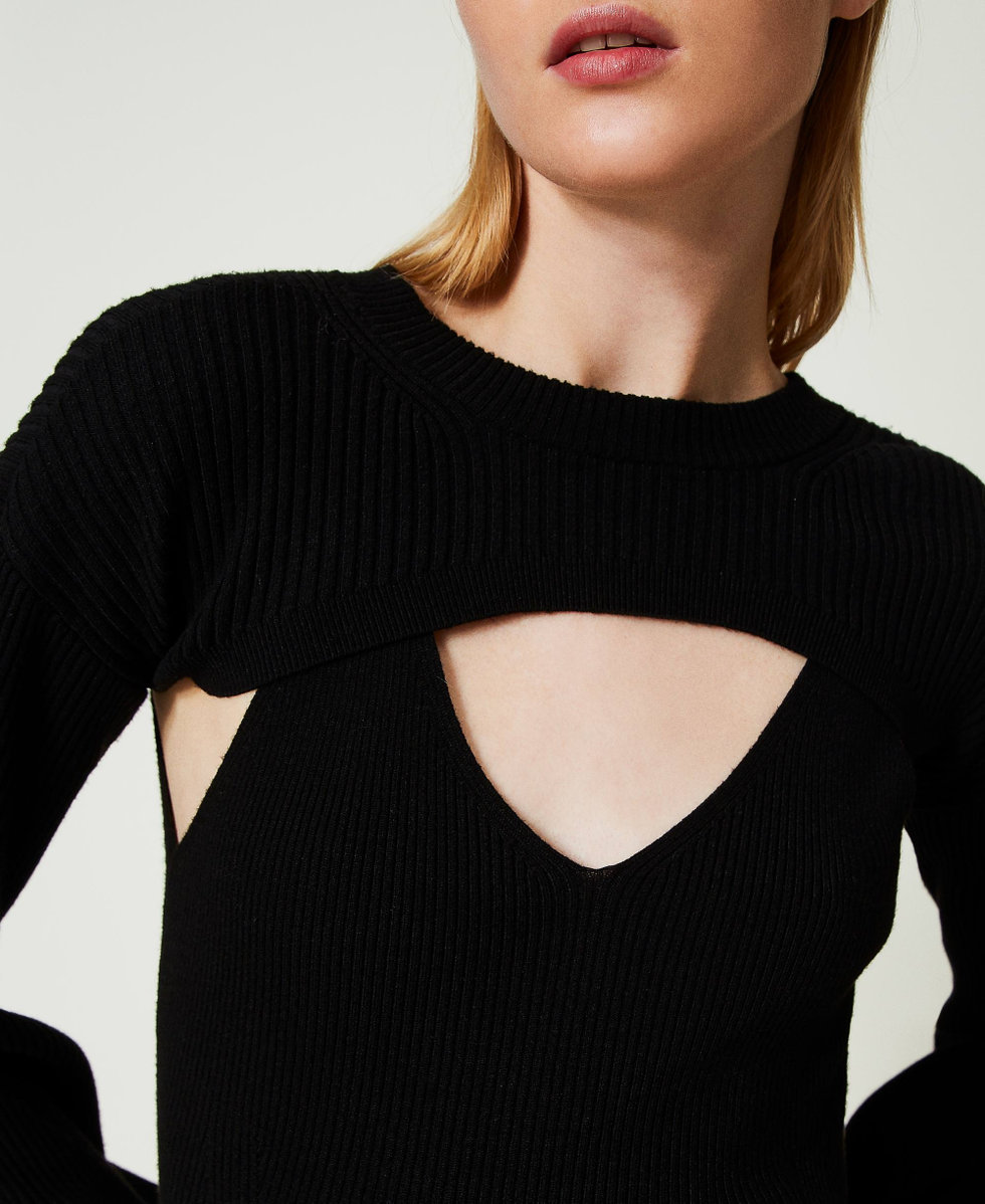 Abito e coprispalle in maglia con catena Oval T