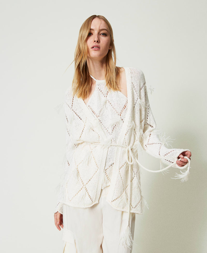 Cardigan à losanges avec plumes