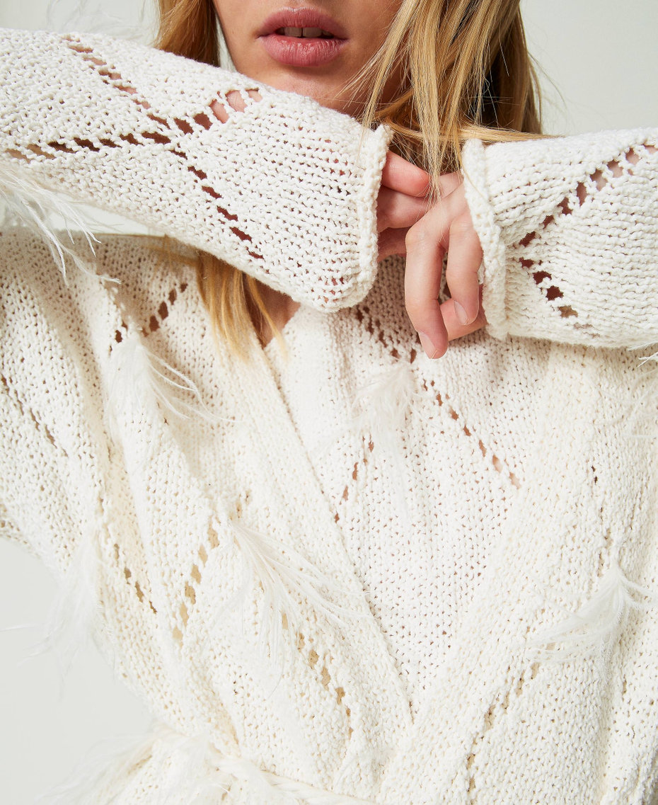 Cardigan à losanges avec plumes