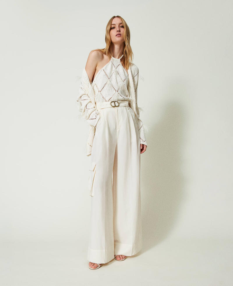 Cardigan à losanges avec plumes