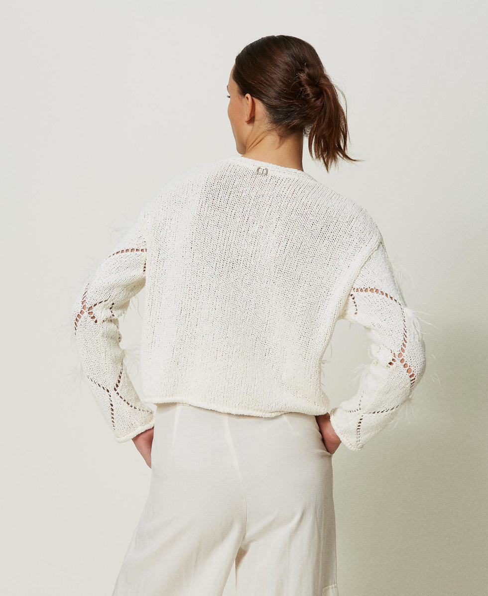 Diamond-pattern jumper with feathers