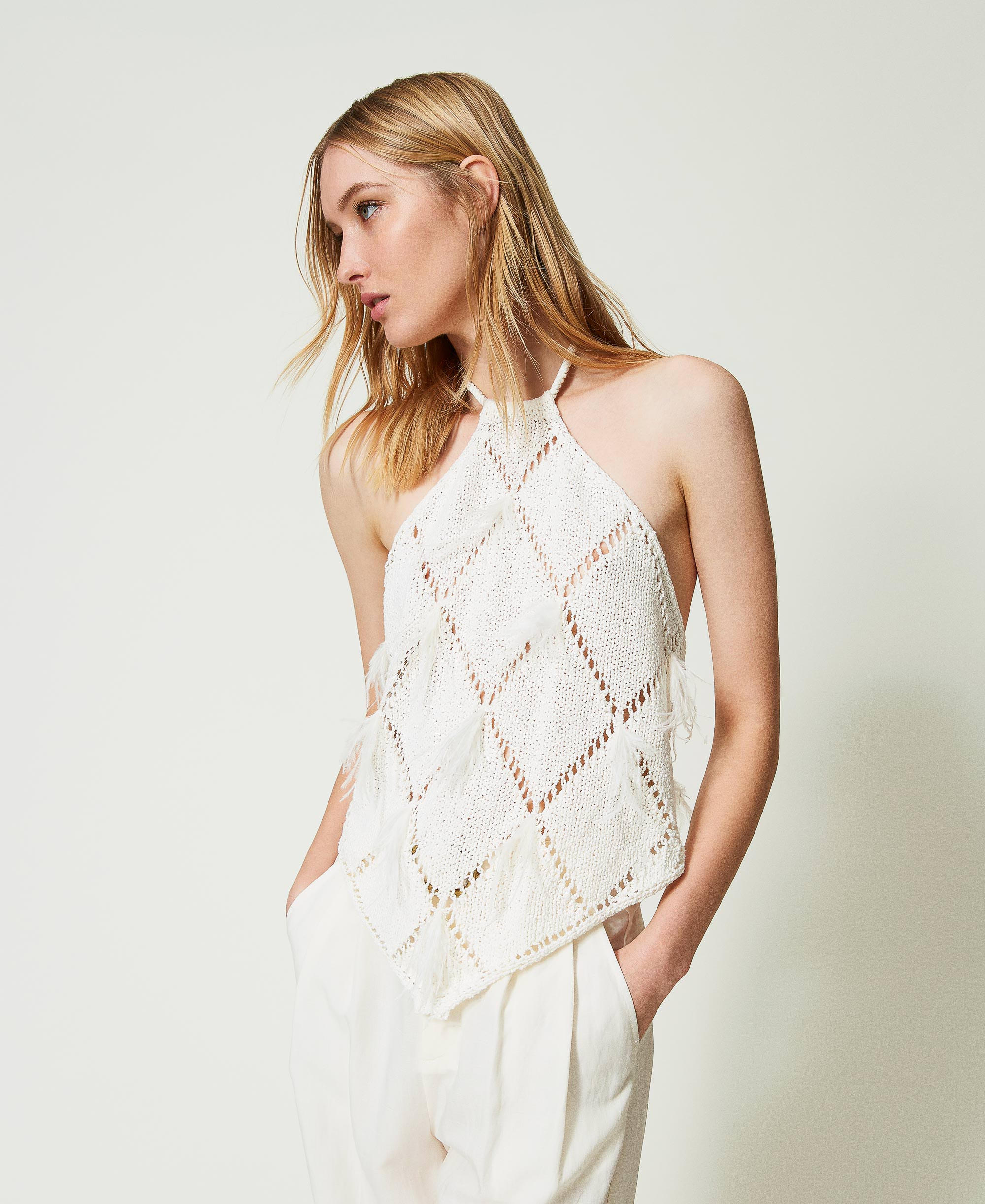 Diamond-pattern top with feathers