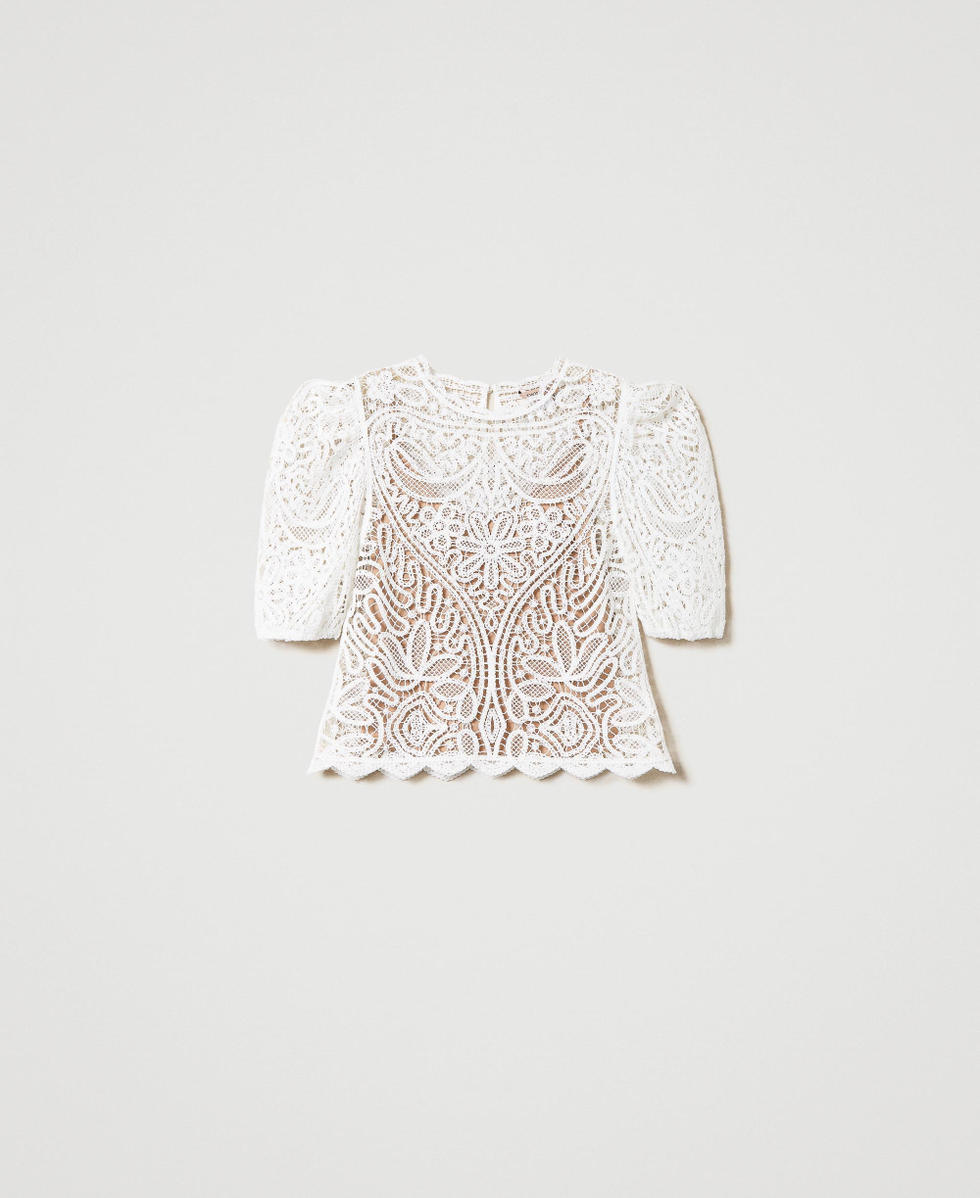 Lace-like crochet jumper with balloon sleeves