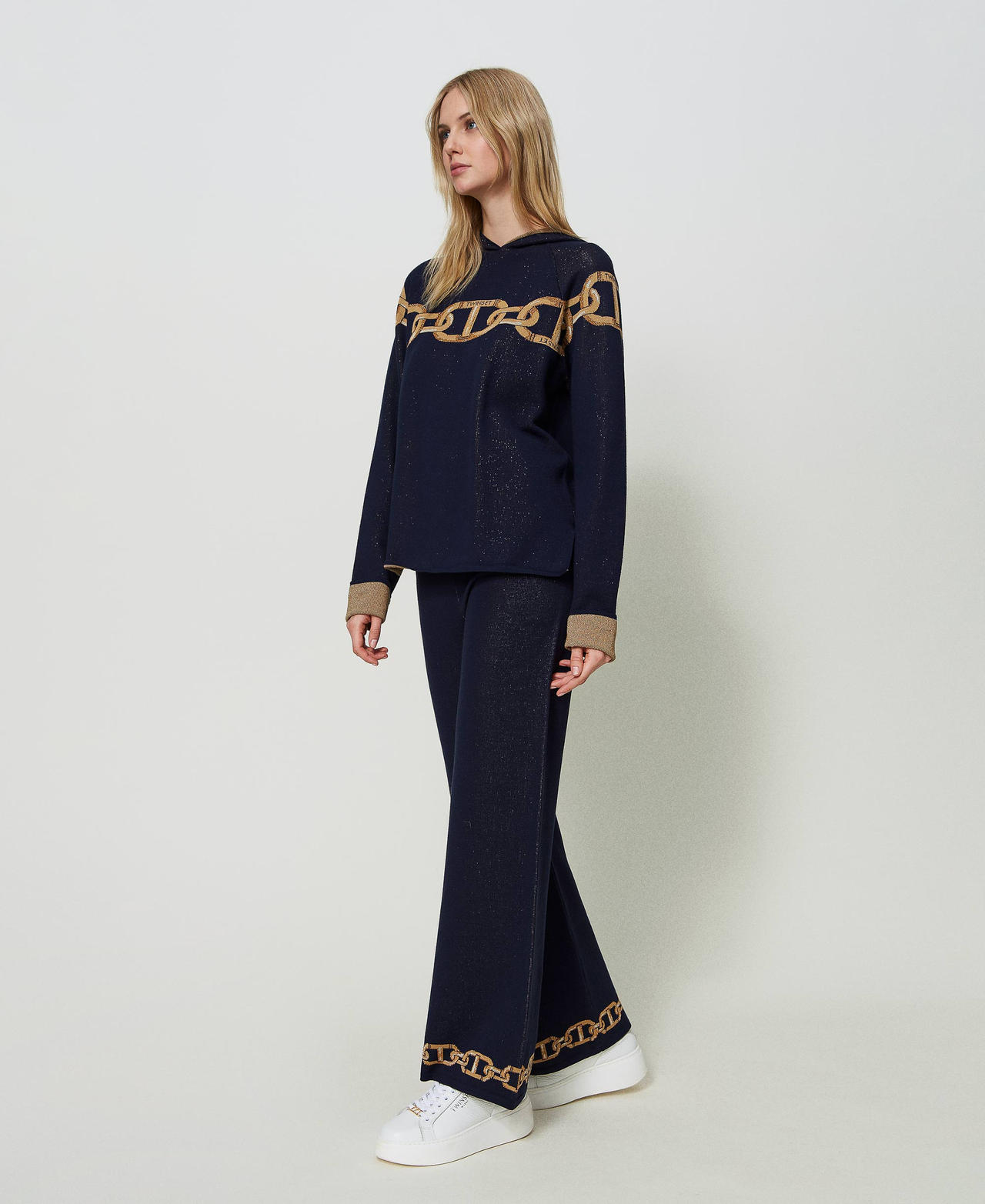 Jacquard knit trousers with chains