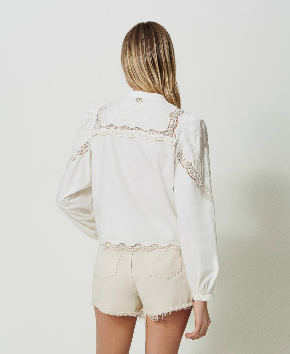 Shirt with floral embroideries