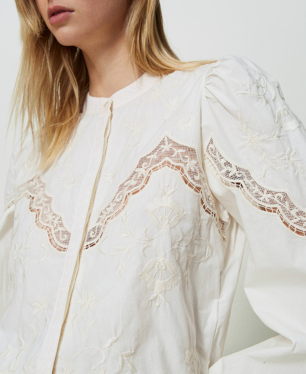 Shirt with floral embroideries