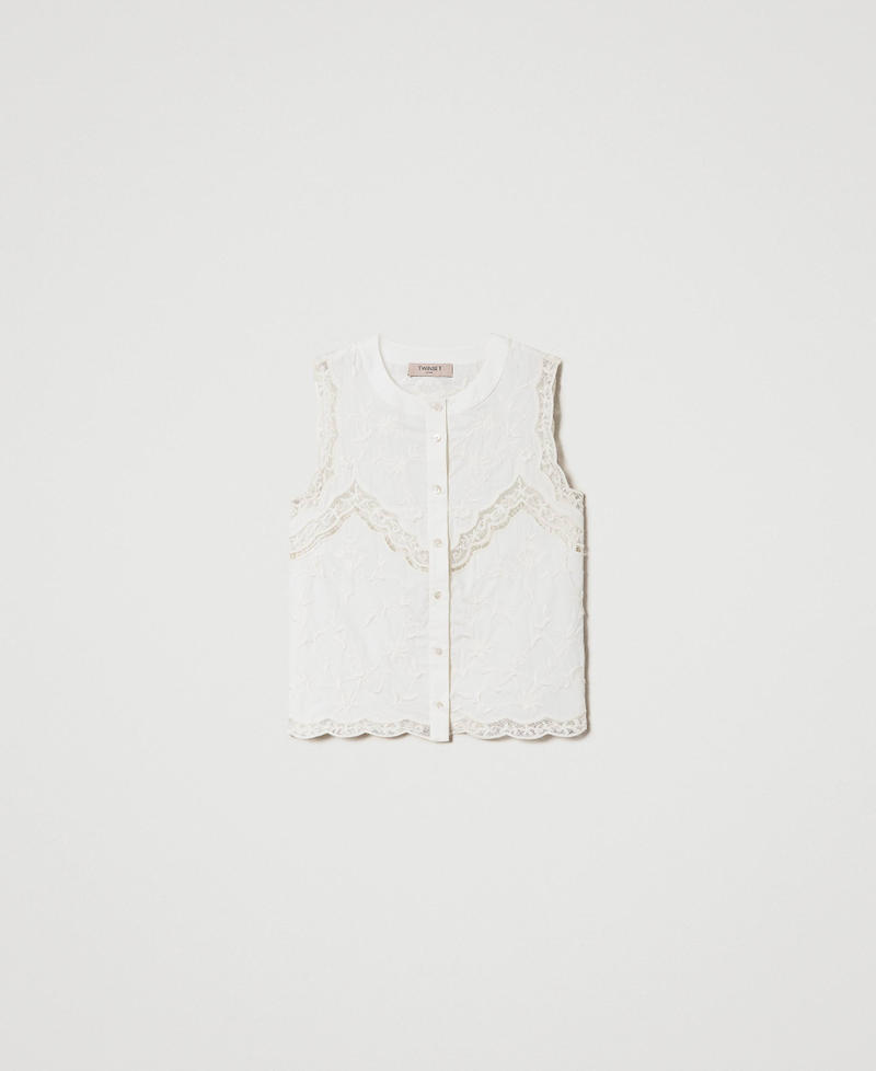 Sleeveless top with floral embroideries
