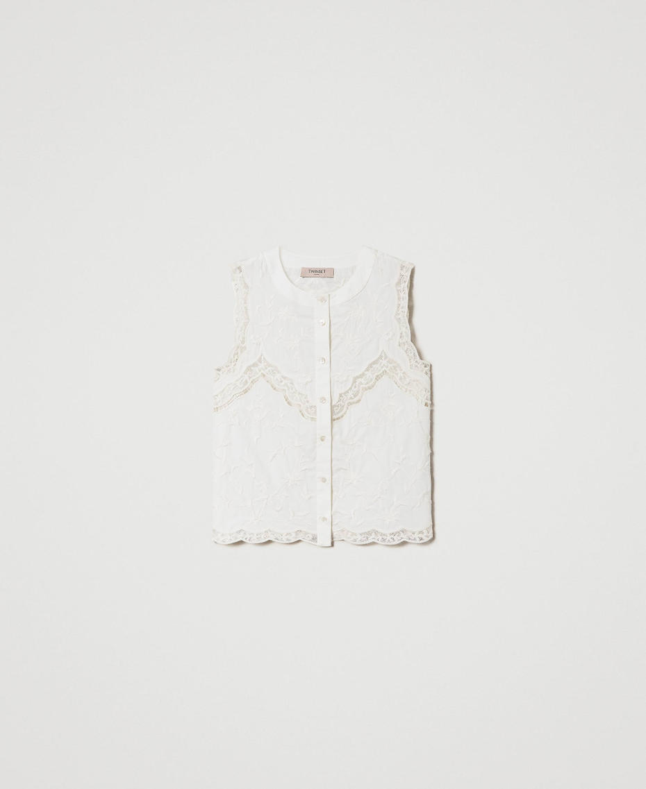 Sleeveless top with floral embroideries