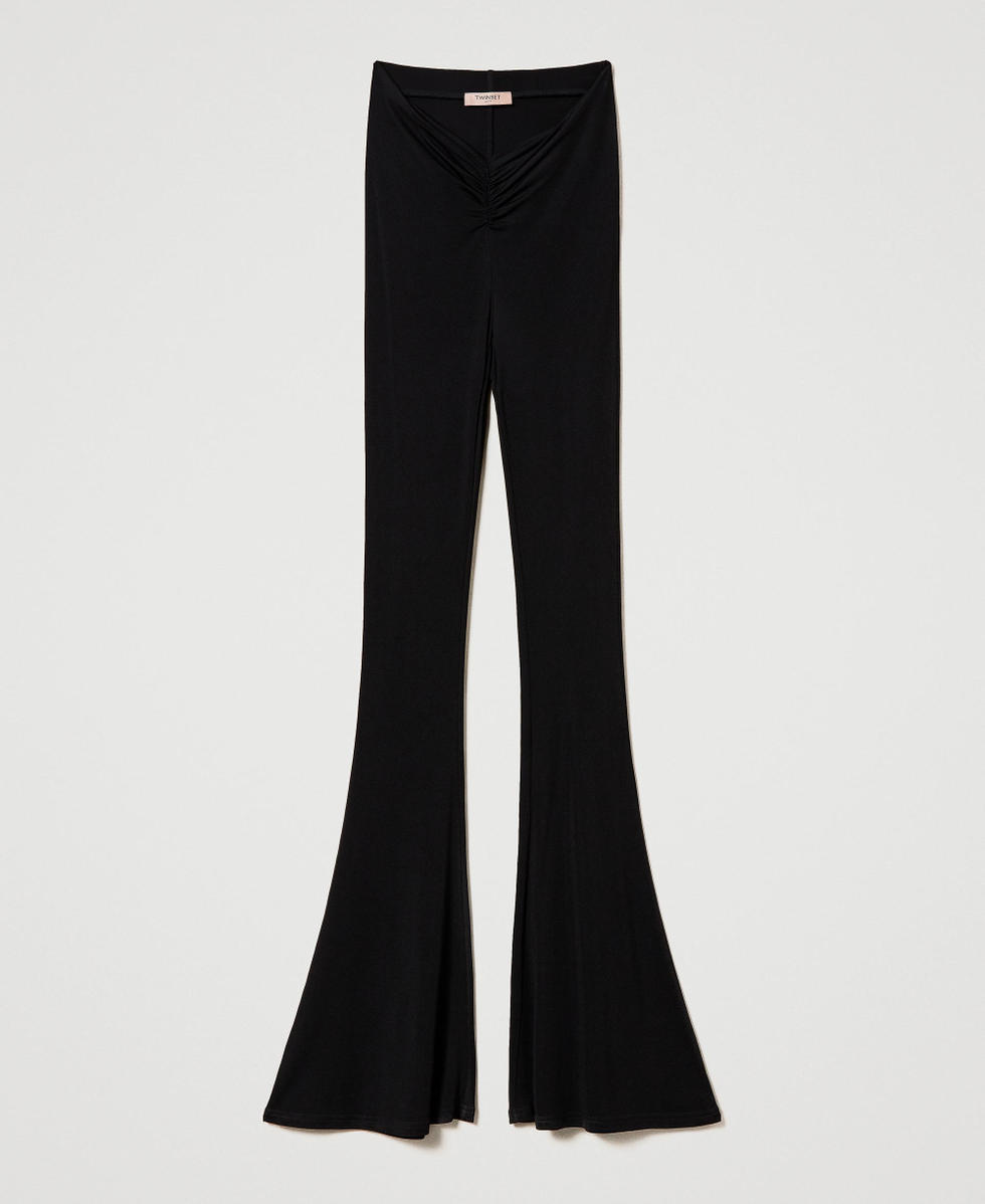 Pantalon noir evasé en bas sale
