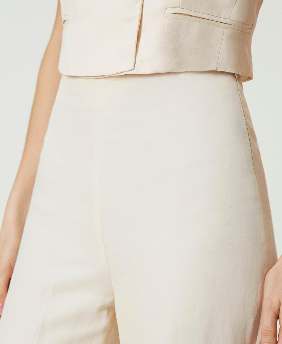 Flared linen blend trousers