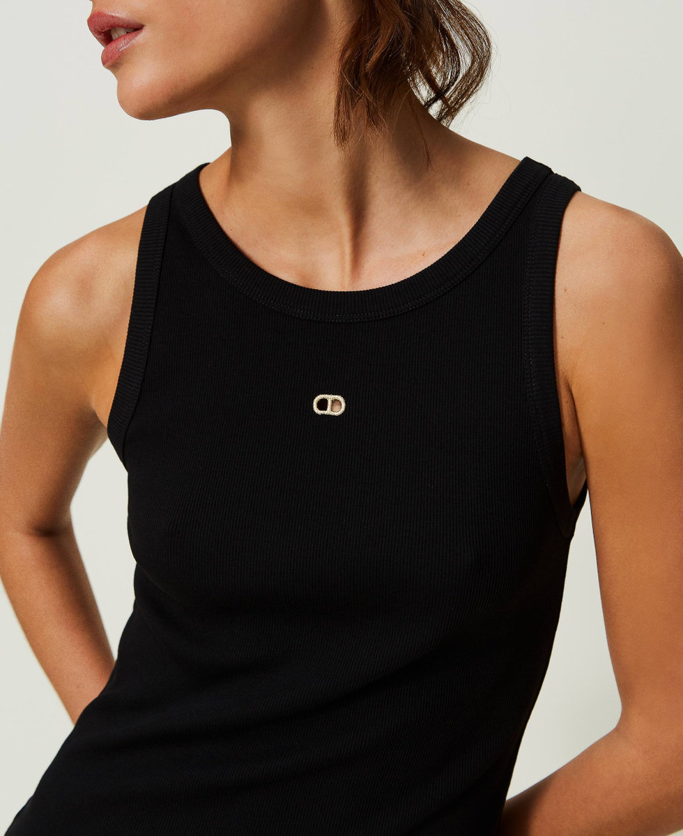 Geripptes Stricktop mit Oval T