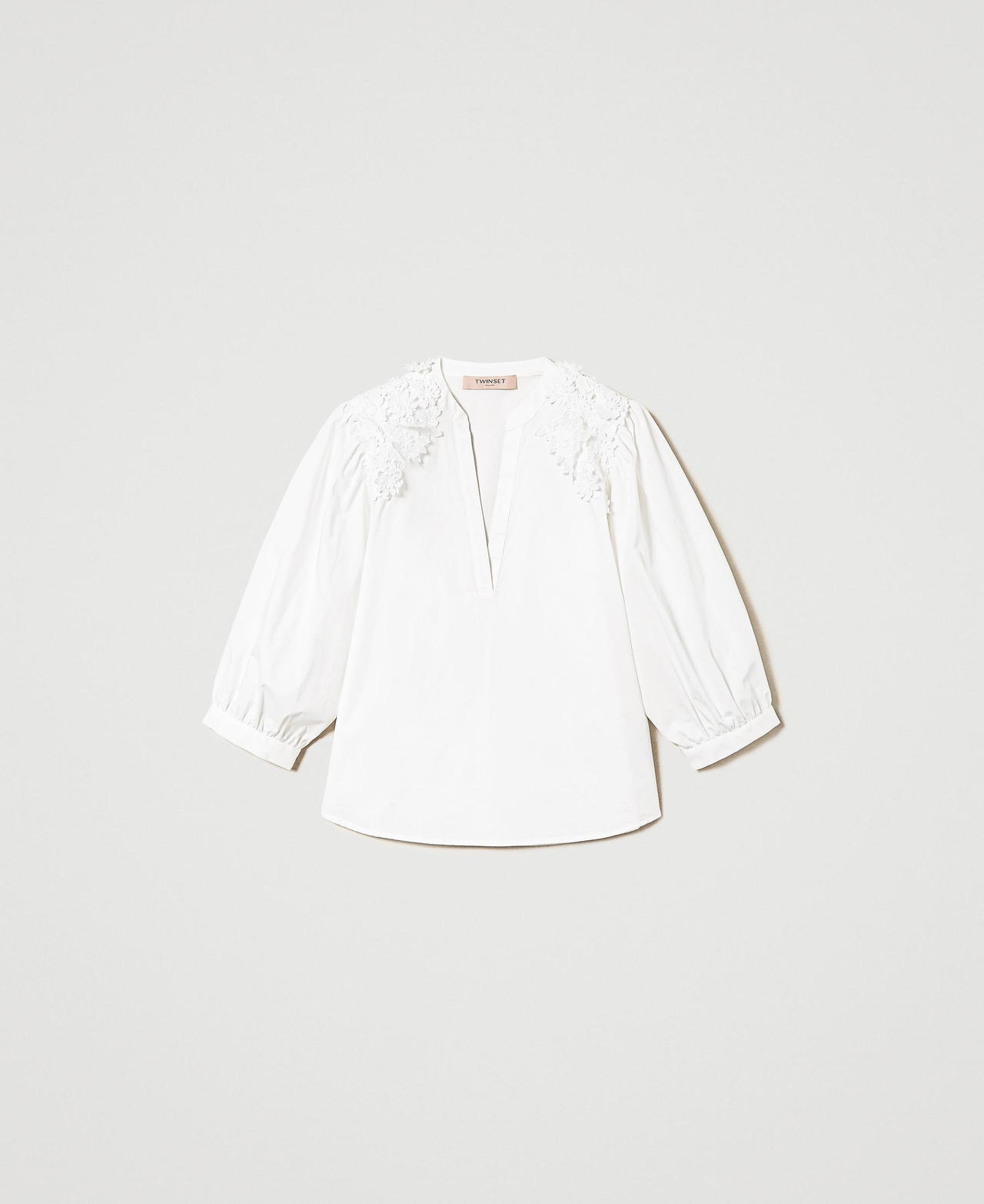 Poplin blouse with floral patches