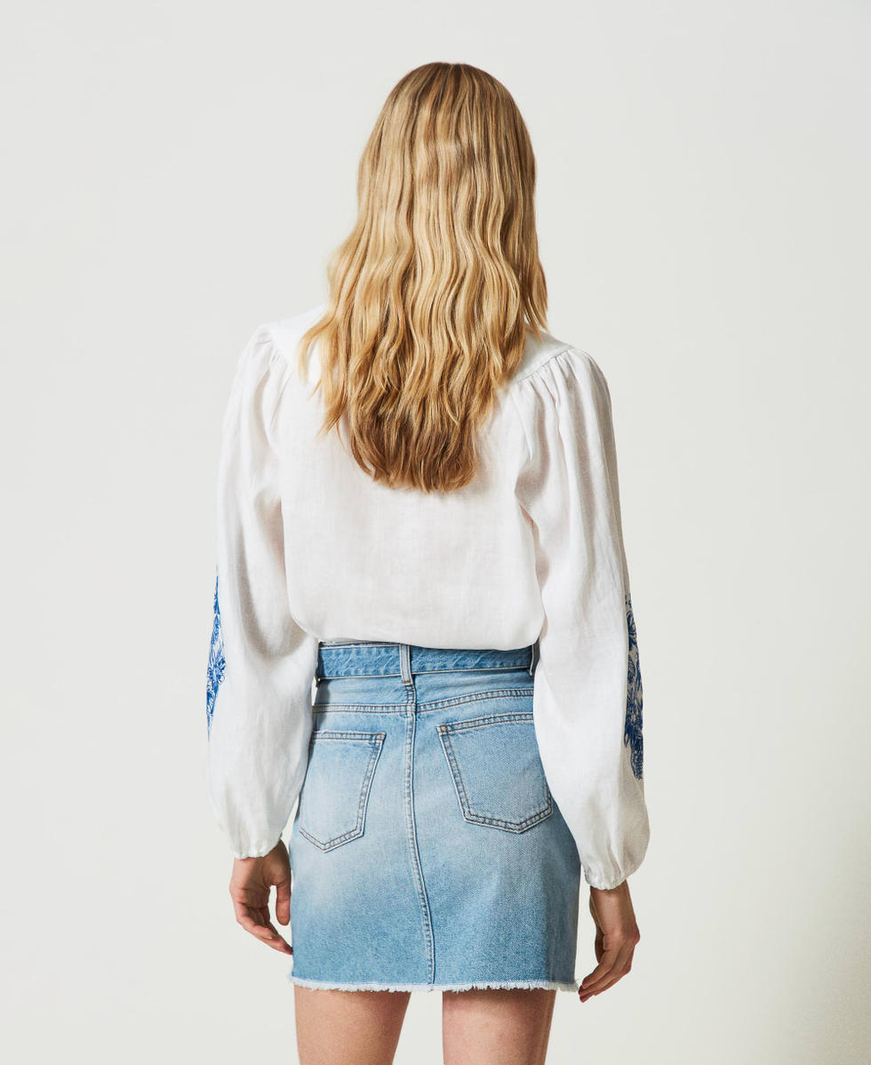 Mini-jupe en jean avec ceinture Oval T