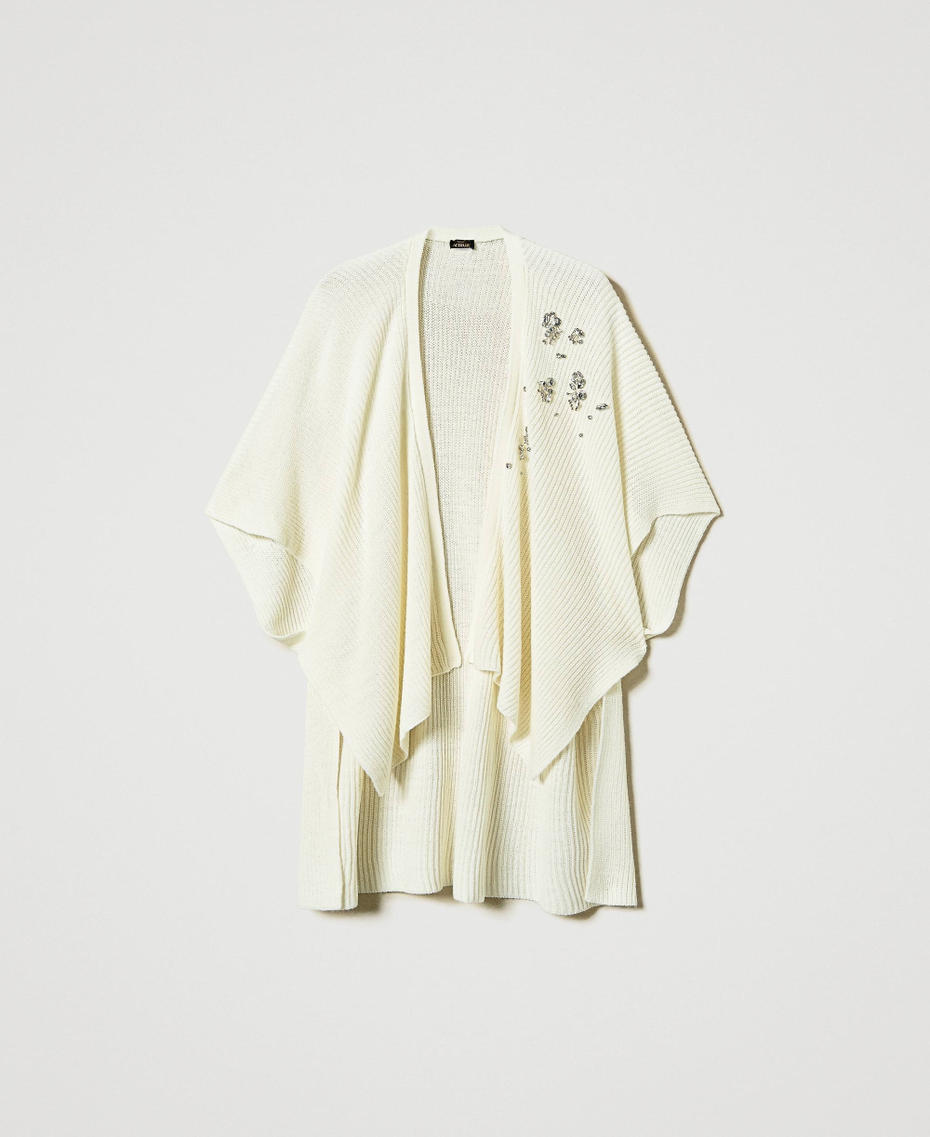 Knit poncho with embroidery