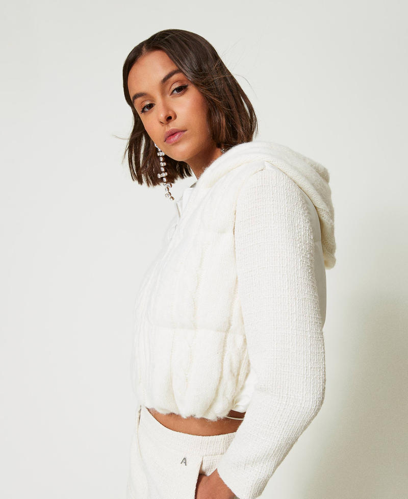 Padded gilet with cable knit pattern