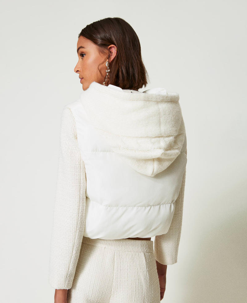 Padded gilet with cable knit pattern
