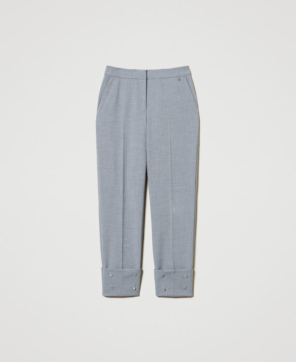 Pantaloni con ricami a mano