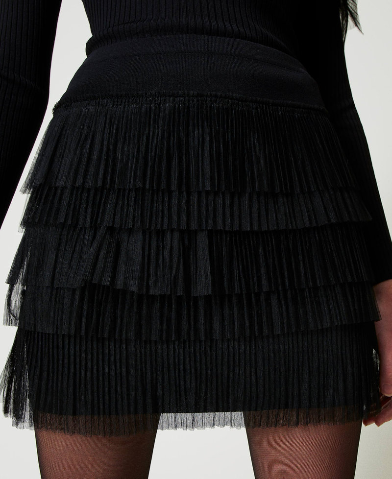 Knit miniskirt with tulle flounces