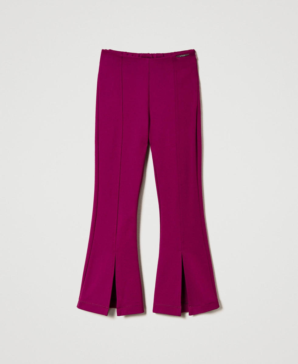 Flared trousers with slit