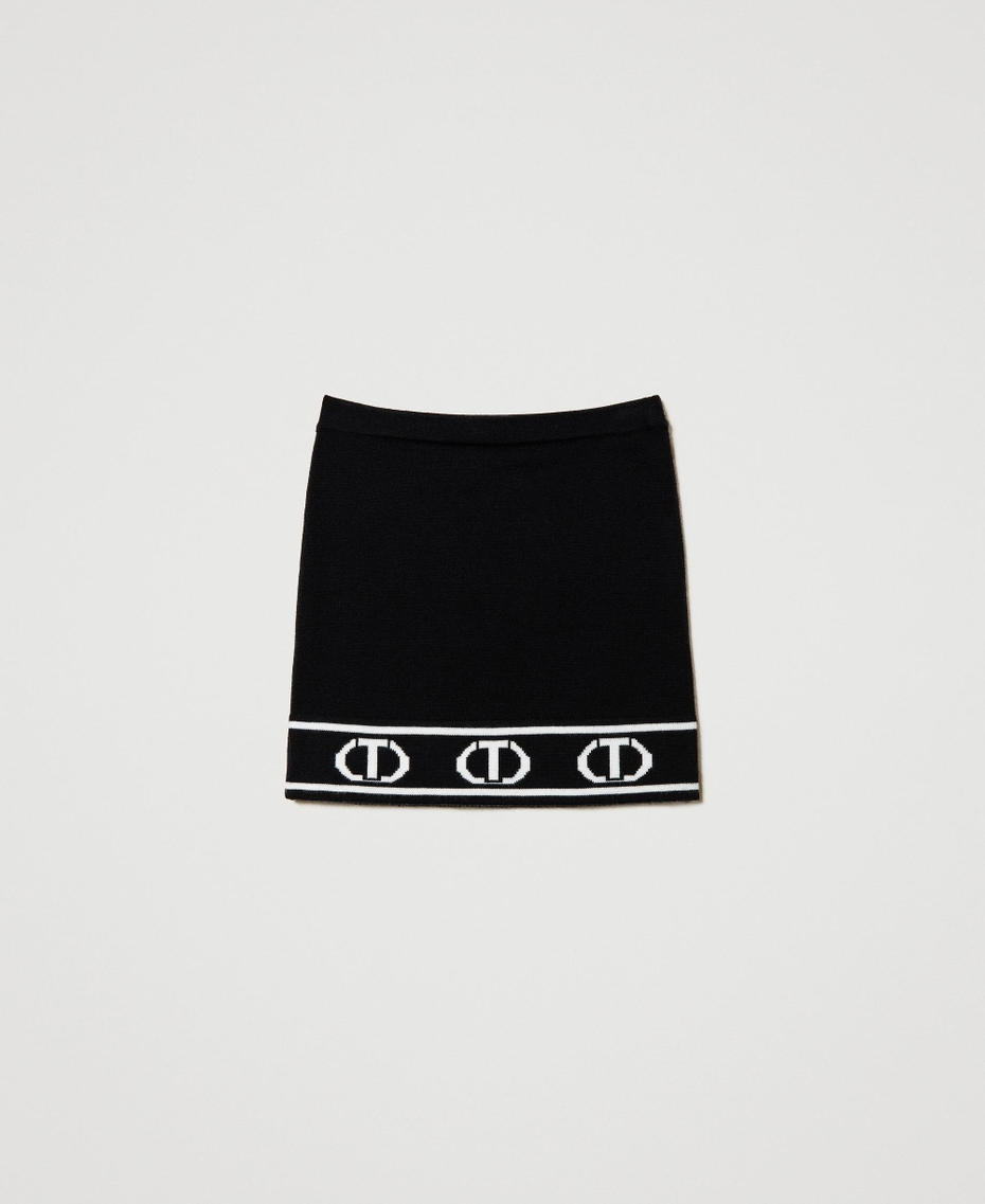 Short knit skirt with jacquard Oval T