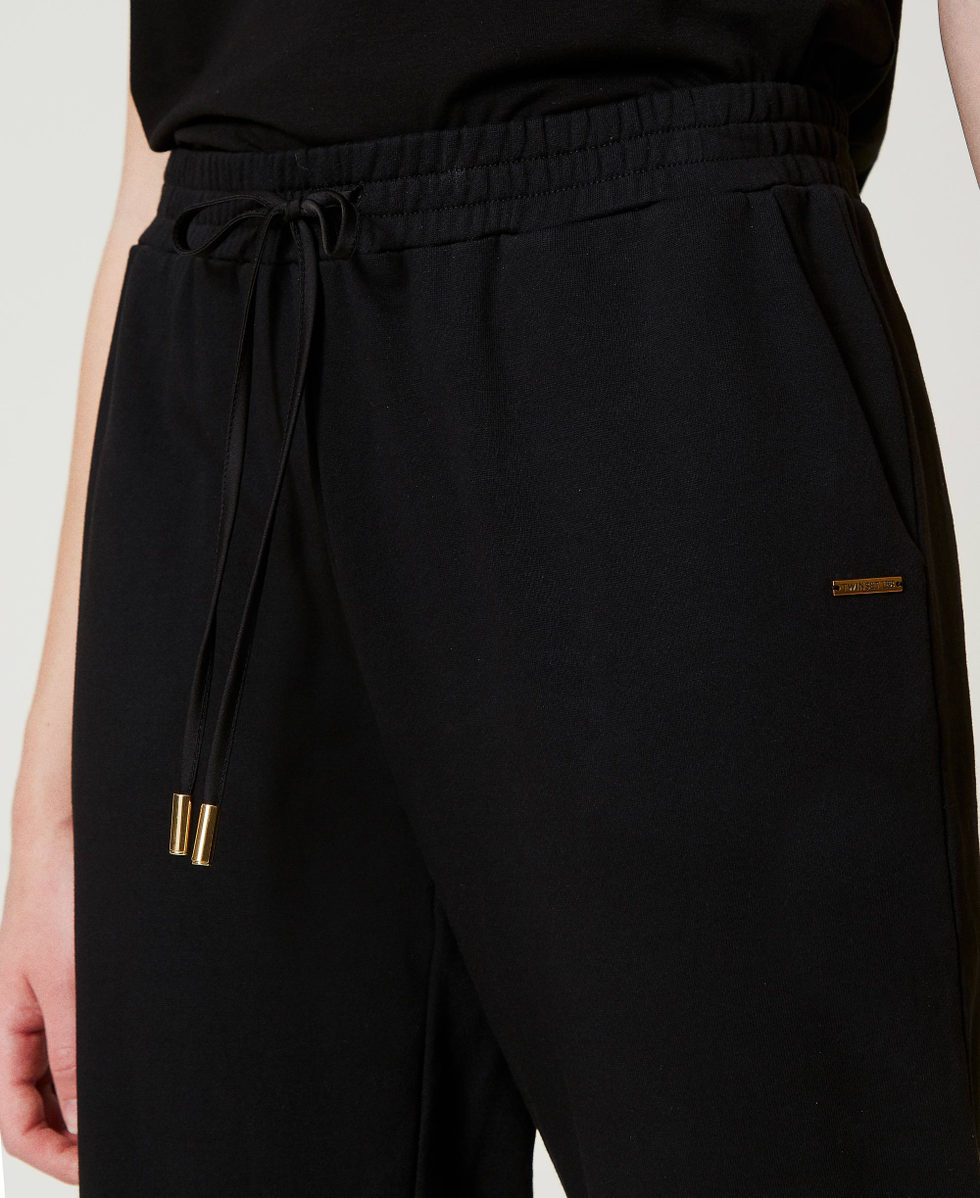 Sweatjoggers mit Satin Schwarz Frau 242LI2HKK_00006_04