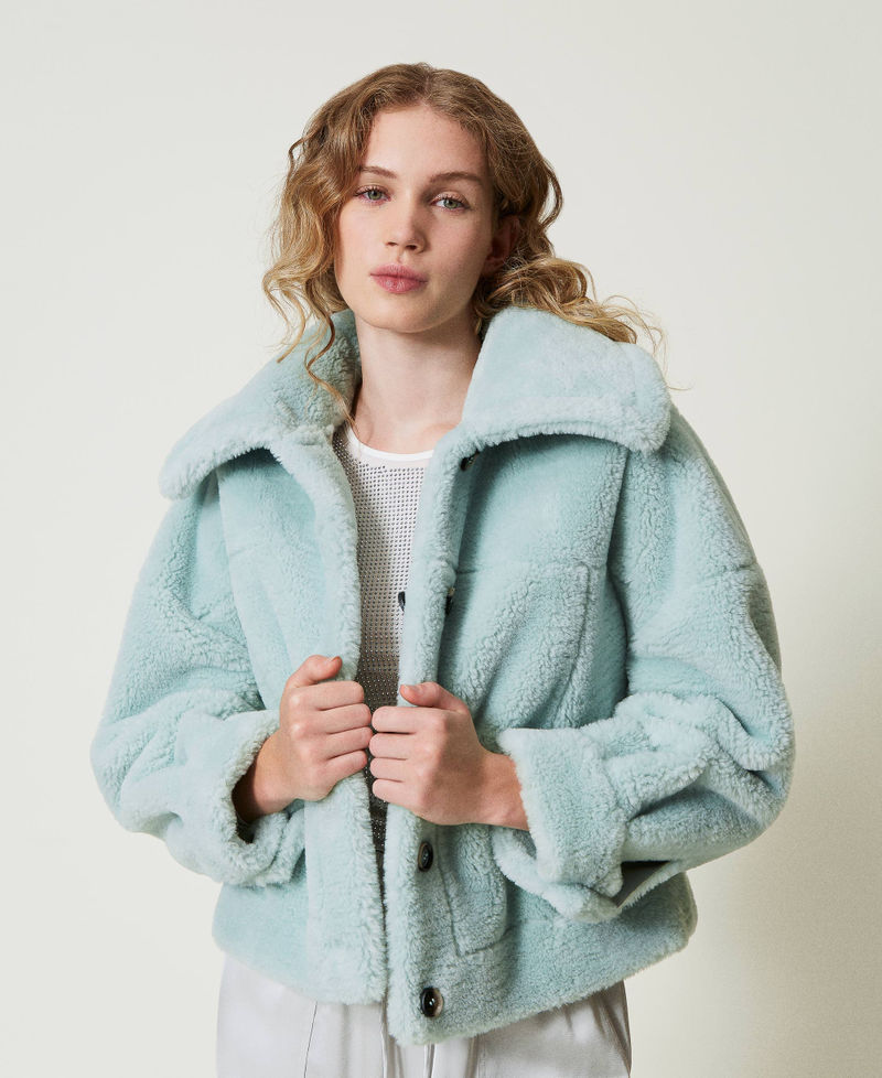 Reversible jacket with faux fur