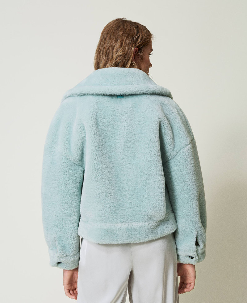 Reversible jacket with faux fur